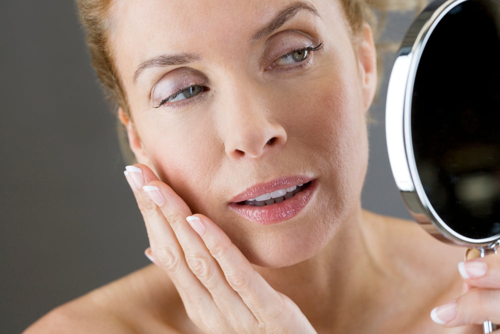 Looking in the mirror at a youthful, wrinkle-free appearance