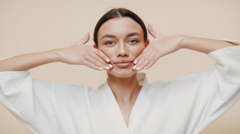 Person using Jawzrsize device for facial fitness as part of a daily biohacking routine